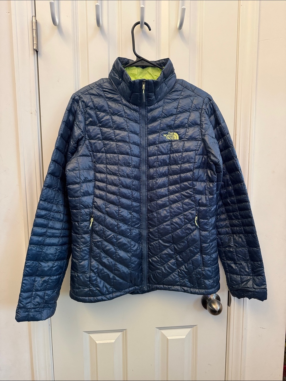 The North Face Women's Navy 💙 Puffer Jacket with Lime Accents